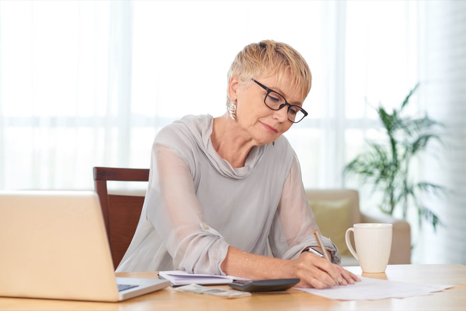 Woman counting expenses