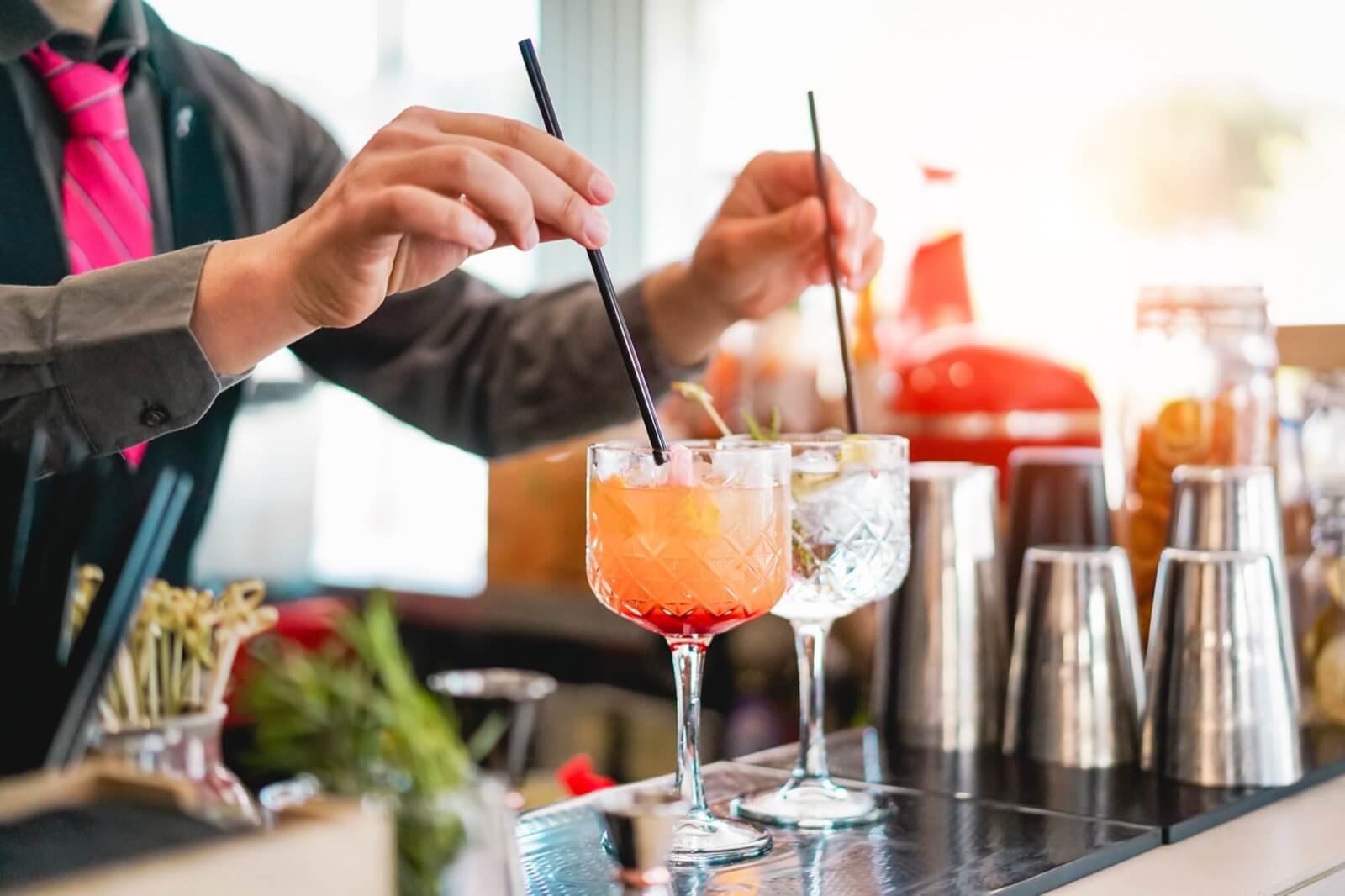 Bartender Making Cocktails at Bar in Miami